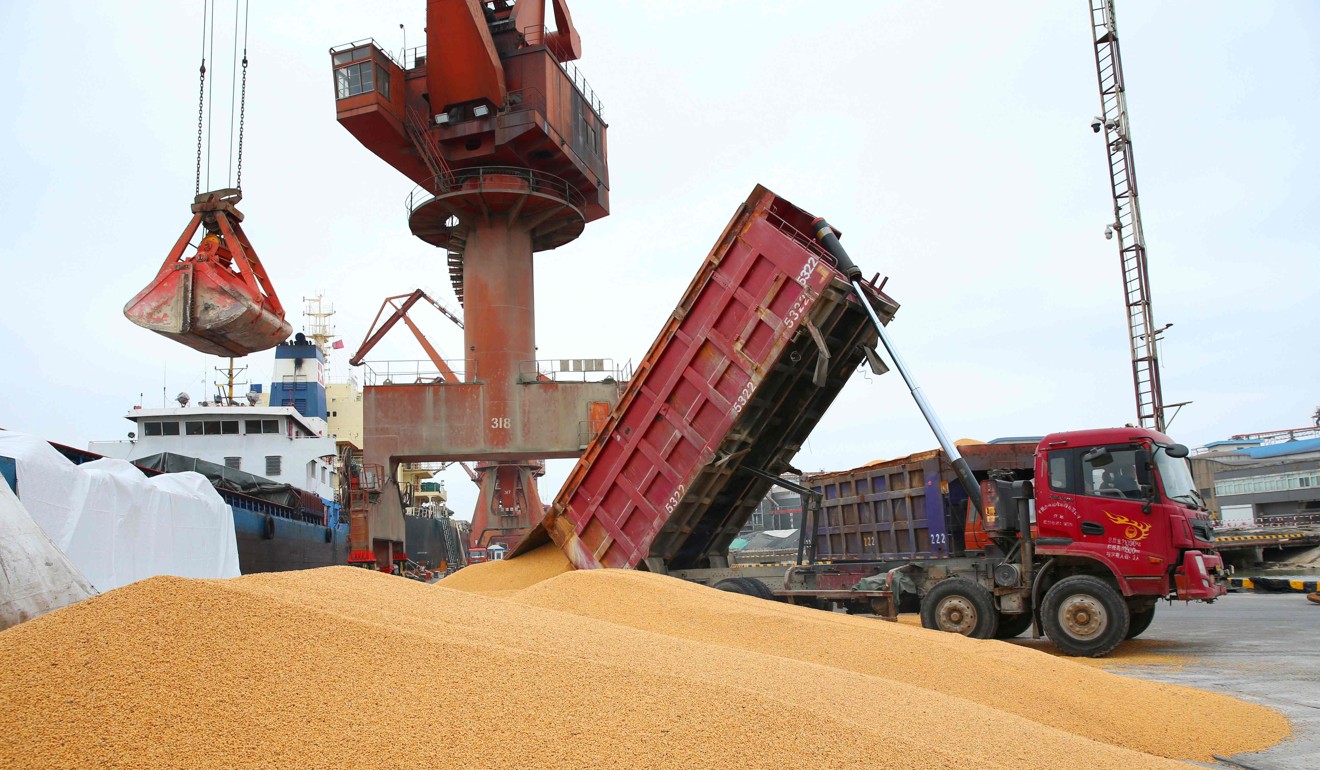 Soybeans are loaded onto a truck at a port in Nantong, China. China unveiled plans to hit major US exports, such as soybeans, cars and small aircraft, with $50 billion in retaliatory tariffs. Photo: AFP