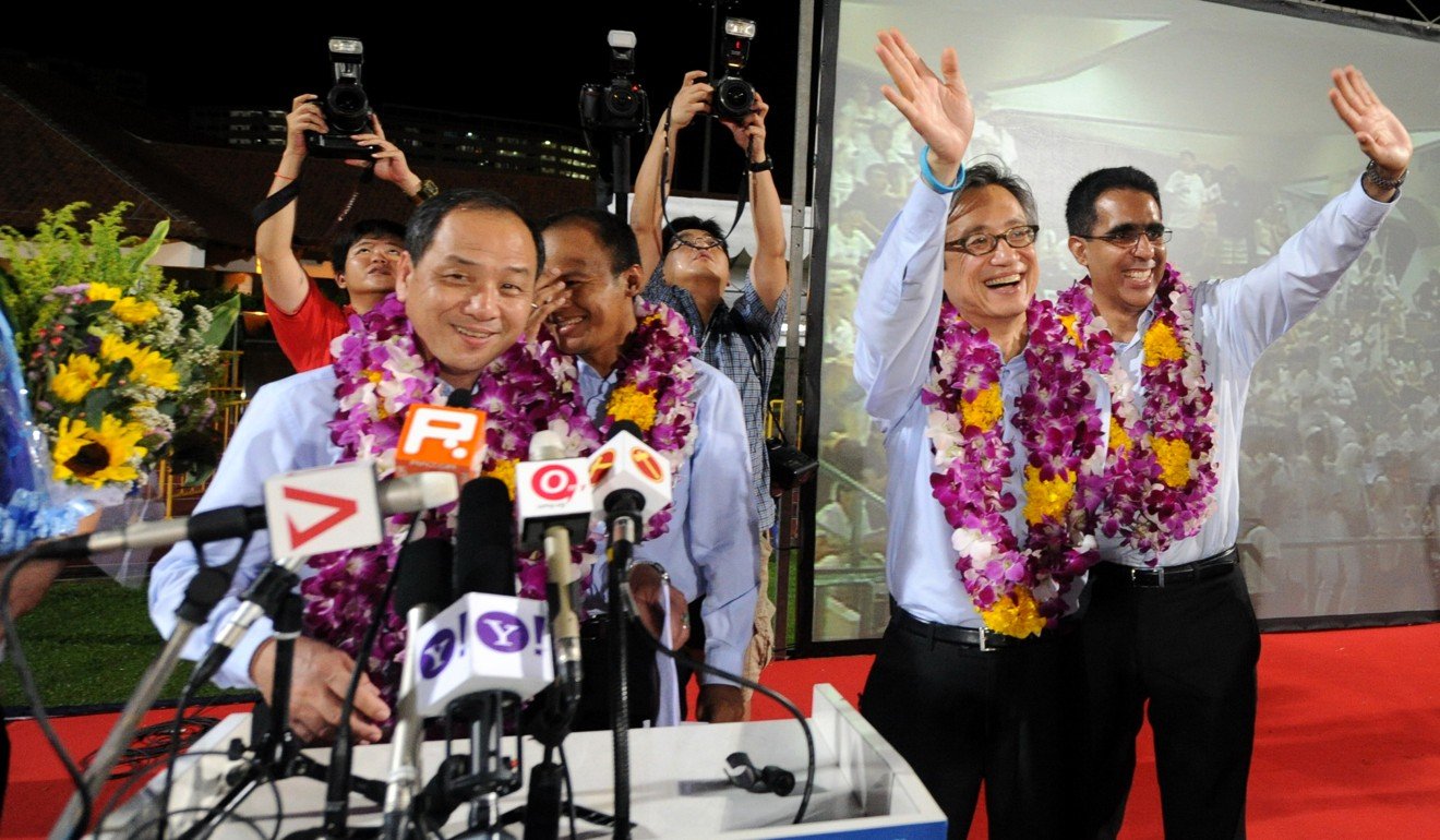 Workers' Party members celebrate their gains in the 2011 election. Photo: AFP
