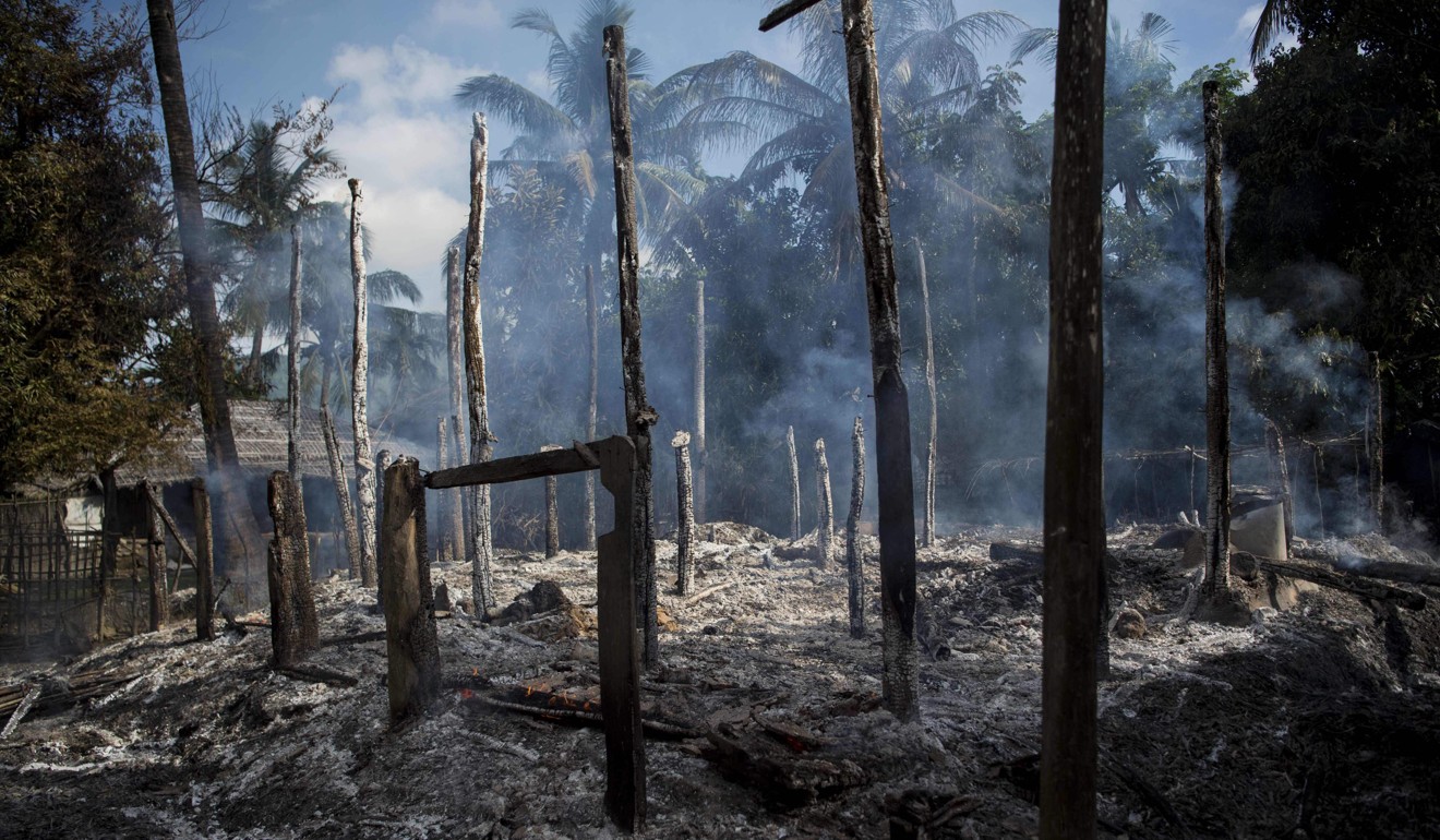 Smouldering debris of burned houses in abandoned Muslim village in Rakhine state in 2016. File photo: AFP