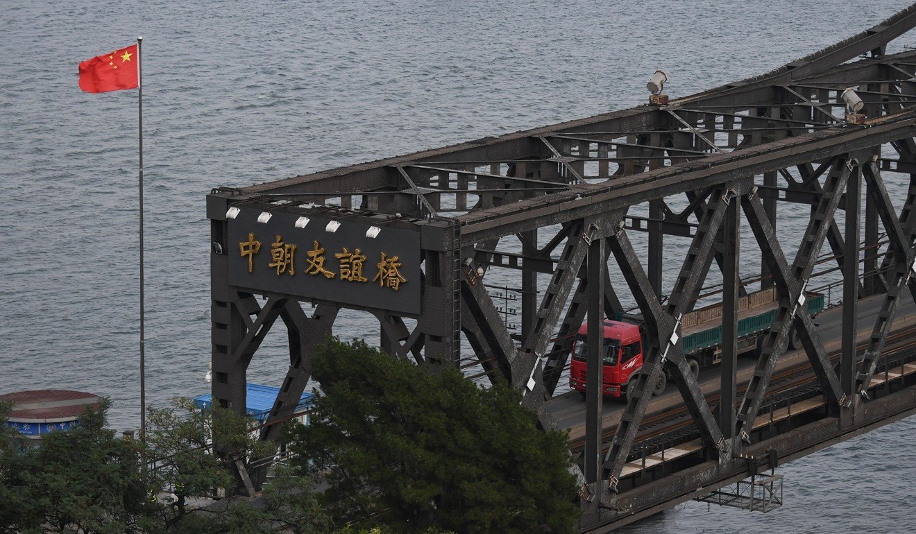 A truck returns from North Korea to China on the Friendship Bridge at the Chinese border city of Dandong. Photo: AFP