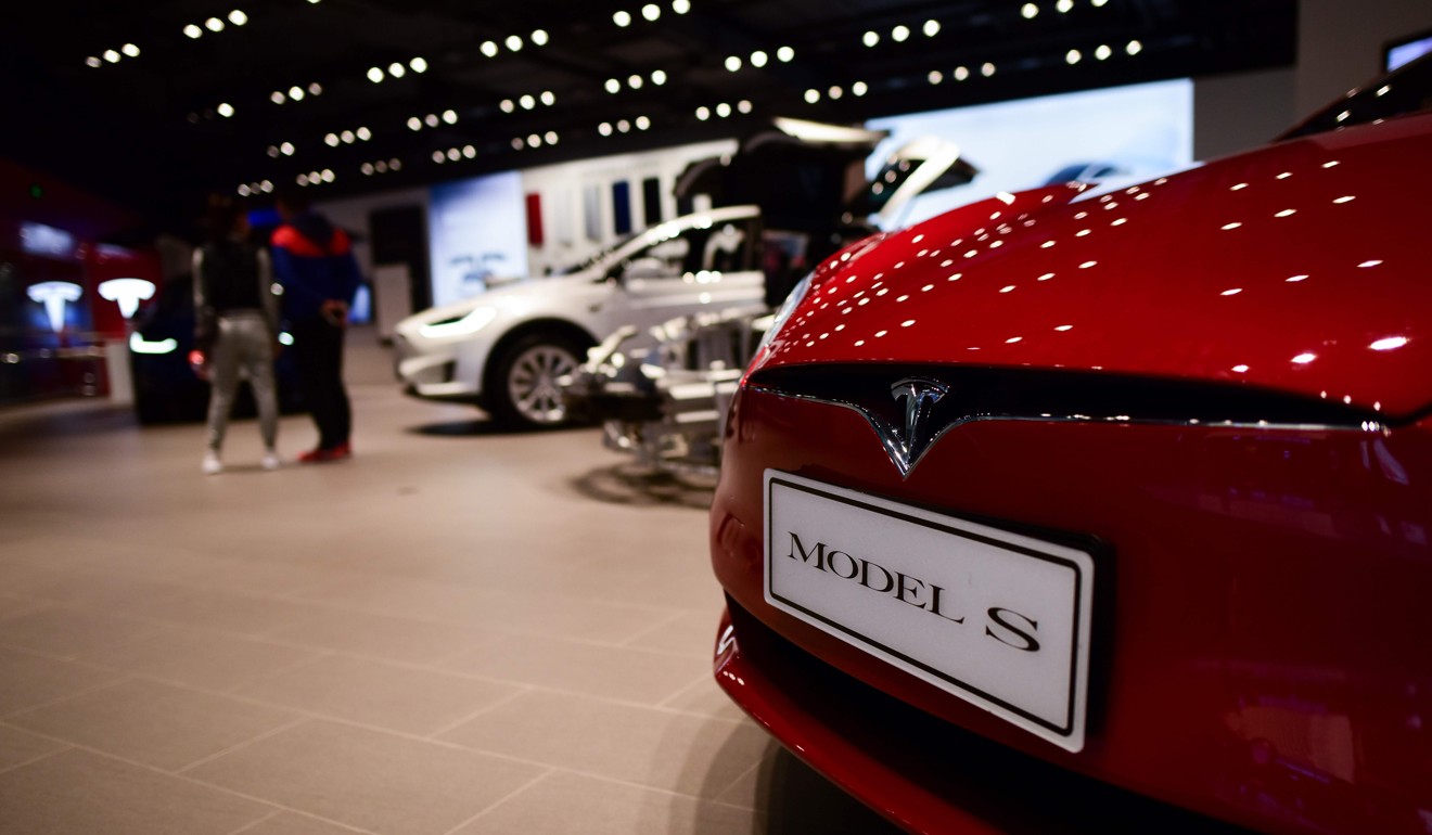 China will lift foreign ownership restrictions in the car industry, Xi Jinping said in a clear hint that firms such as Tesla will be allowed to set up wholly owned plants in the country. Photo: AFP