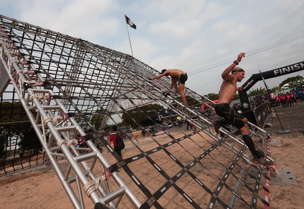 Aussie couple come back to conquer at Hong Kong Spartan Race – after using  last year's prize money to tie the knot