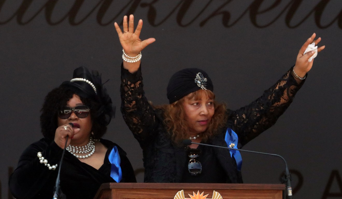 Daughters of Winnie Madikizela-Mandela, Zindzi Mandela and Zenani Dlamini Mandela, speak at their mother’s funeral in Orlando stadium in Soweto, South Africa. Photo: Reuters