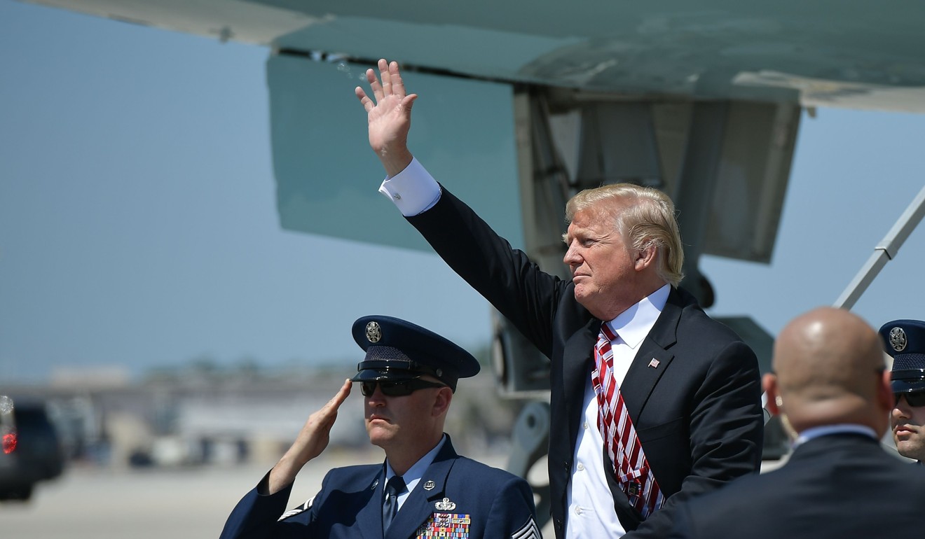 US President Donald Trump steps off Air Force One on Monday. He is reportedly ‘uncomfortable’ on placing the sanctions on Russia unless another chemical attack was to occur. Photo: AFP