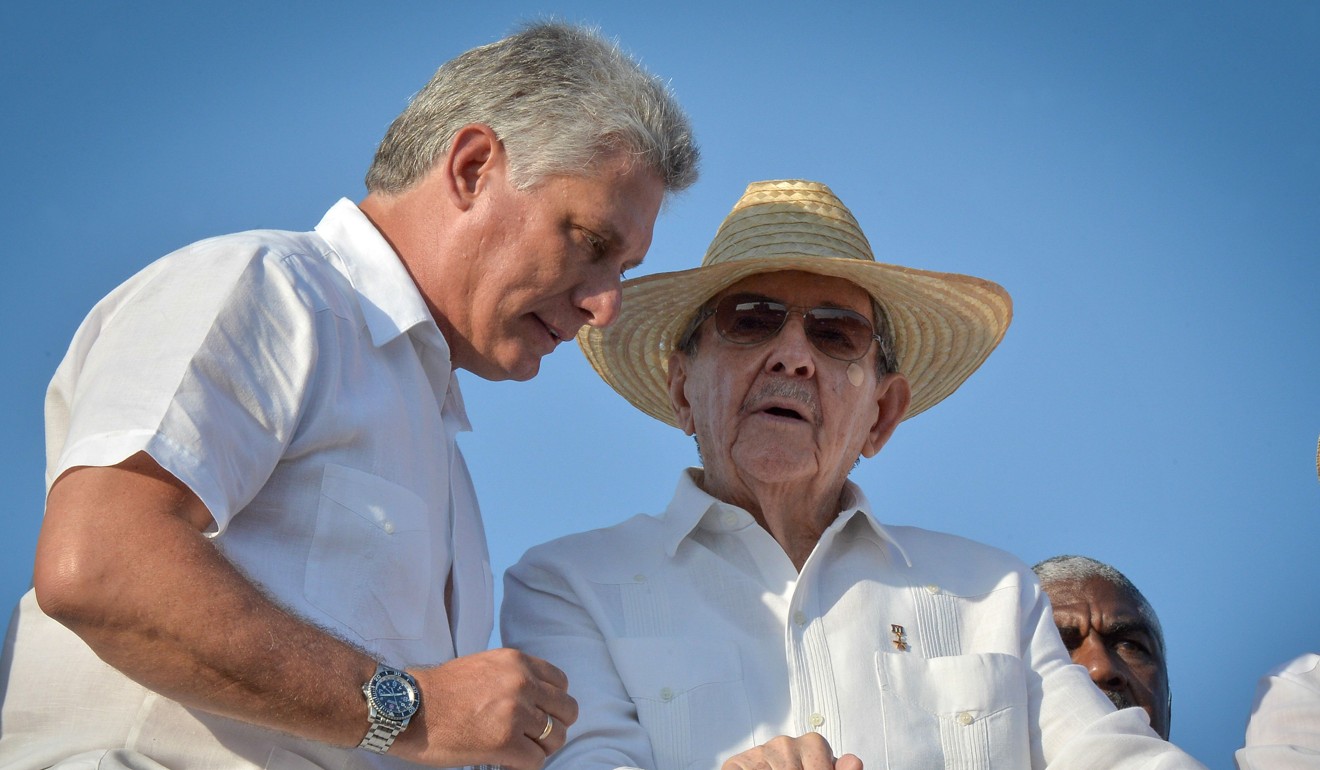 Cuban President Raul Castro, right, and First Vice-President Miguel Diaz Canel attend the May Day parade at Revolution Square in Havana in 2016. Photo: AFP 