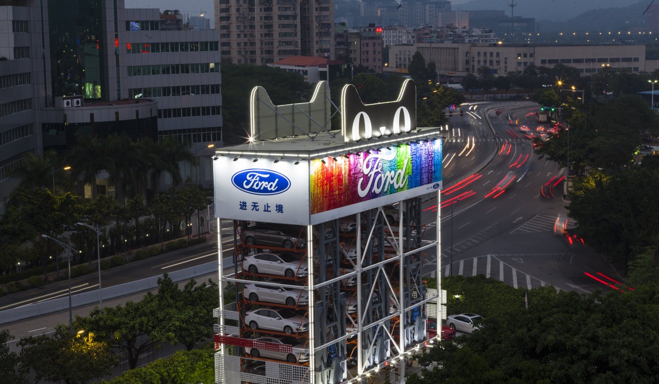 A car-vending machine by US carmaker Ford and Alibaba Group in Guangzhou, China, makes it possible for customers to buy a car in 10 minutes without the help of a salesperson. Photo: EPA-EFE
