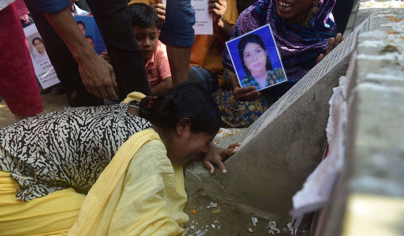 Mourners mark the second anniversary of the Rana Plaza collapse in Bangladesh. Photo: AFP