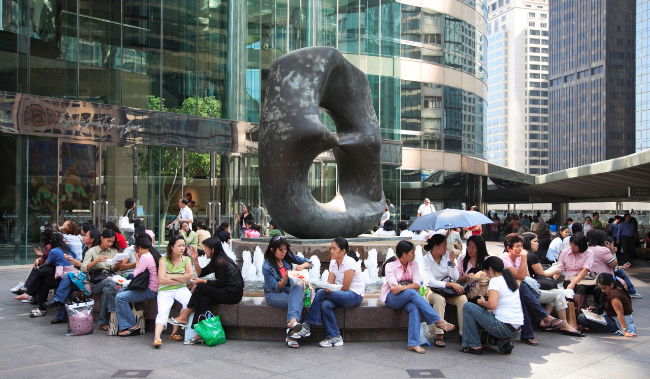 Foreign domestic workers in Hong Kong’s Central district. Photo: Alamy
