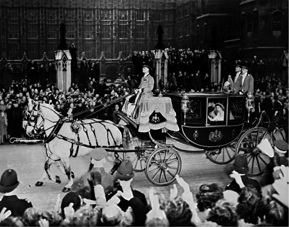 Britain’s future Queen Elizabeth and Prince Philip cheered by crowds after their wedding in 1947. Photo: AFP
