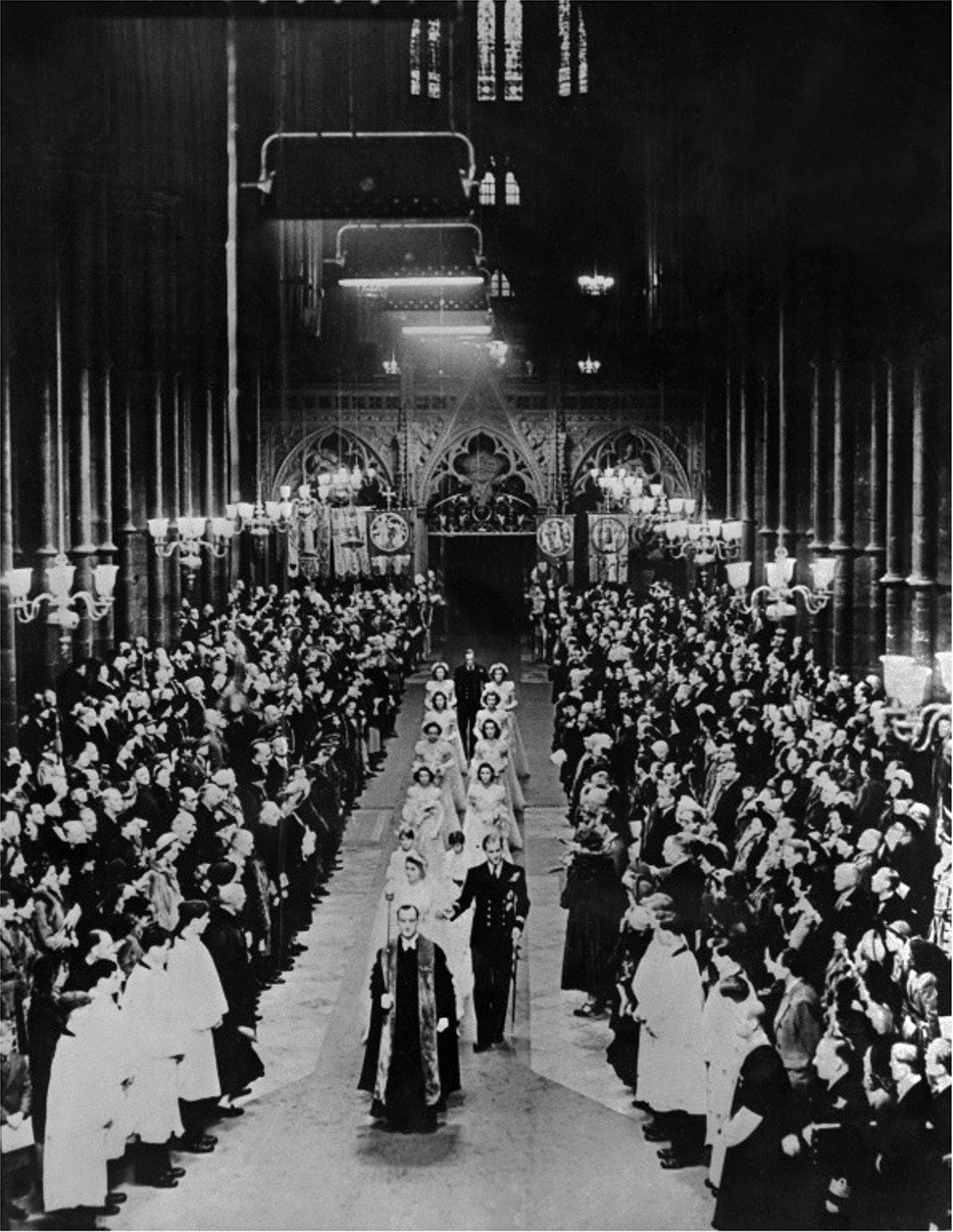 Britain's Princess Elizabeth and Prince Philip walk down the aisle in 1947. Photo: AFP