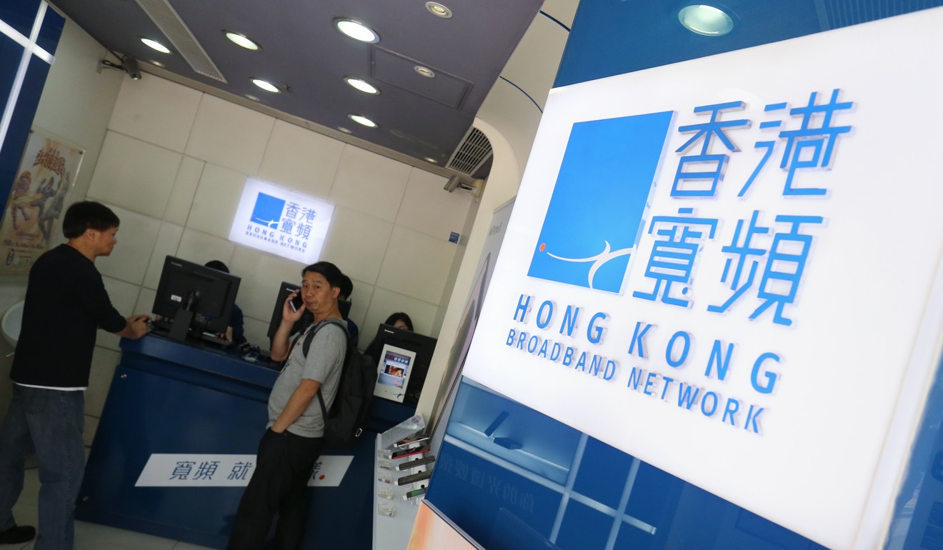 Customers at the Hong Kong Broadband Network (HKBN) store in Fortress Hill. The company has disclosed that personal data of its customers was compromised in a hacking attack. Photo: Dickson Lee