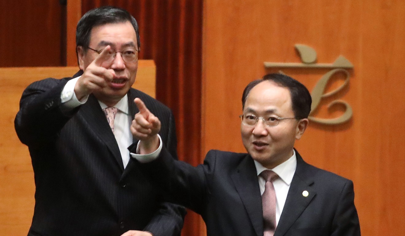 Liaison office director Wang Zhimin (right) with Legco president Andrew Leung. Photo: Sam Tsang