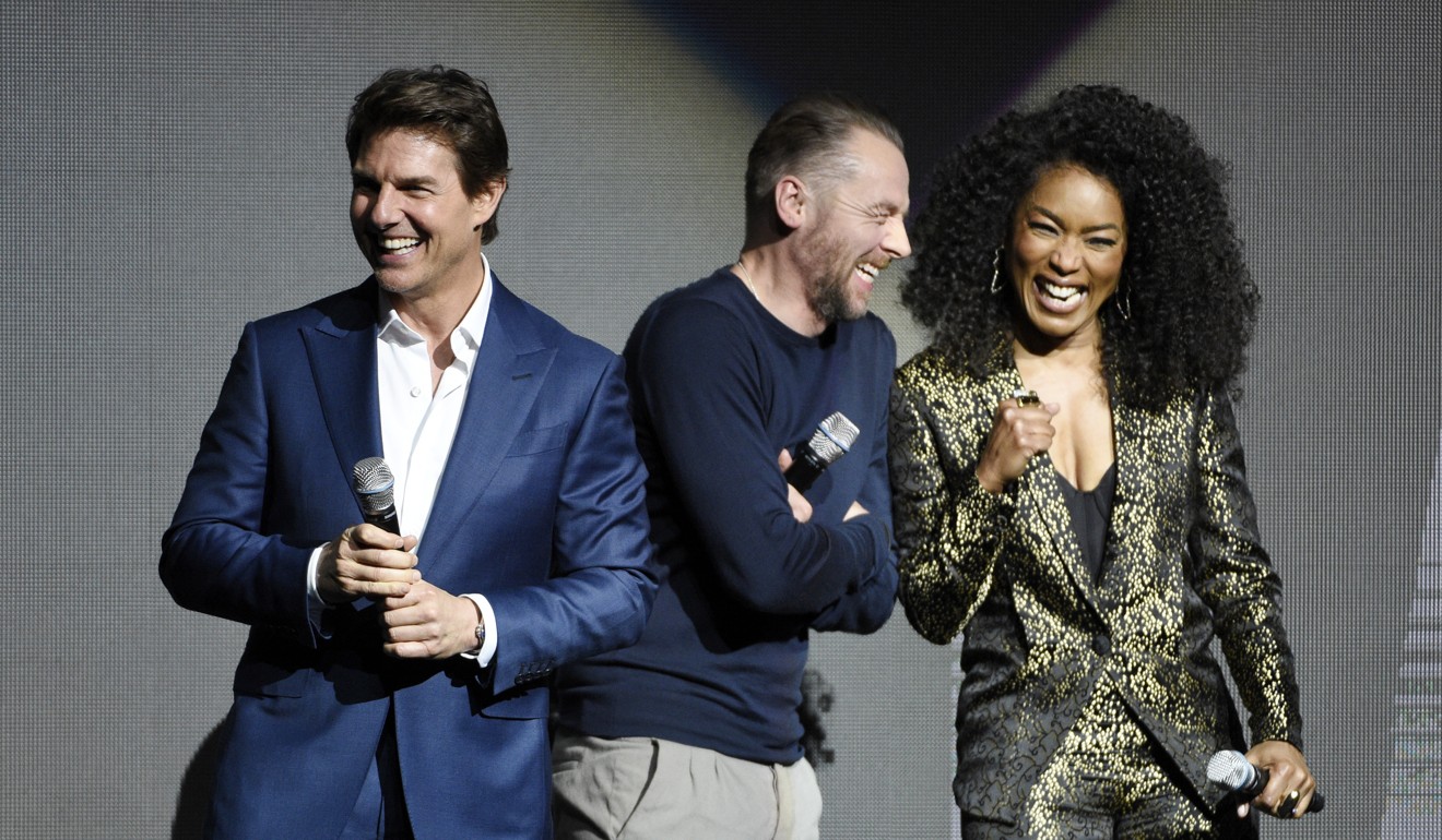 Tom Cruise and his Mission: Impossible – Fallout co-stars Simon Pegg and Angela Bassett onstage during the Paramount Pictures presentation at CinemaCon in Las Vegas. (Photo: Chris Pizzello/Invision/AP