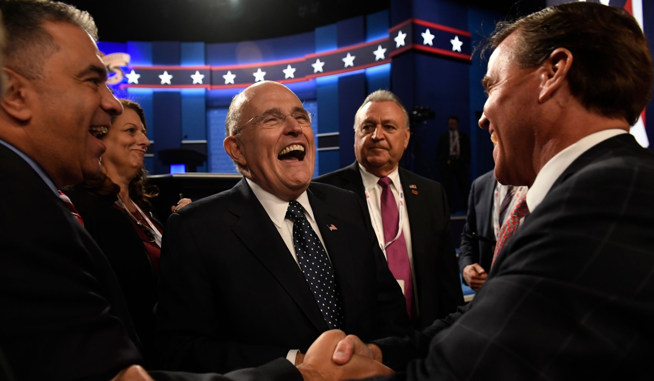 Former New York City mayor Rudolph Giuliani (seen laughing at the final presidential debate on October 19, 2016) has also joined Trump’s legal team recently. Photo: AFP