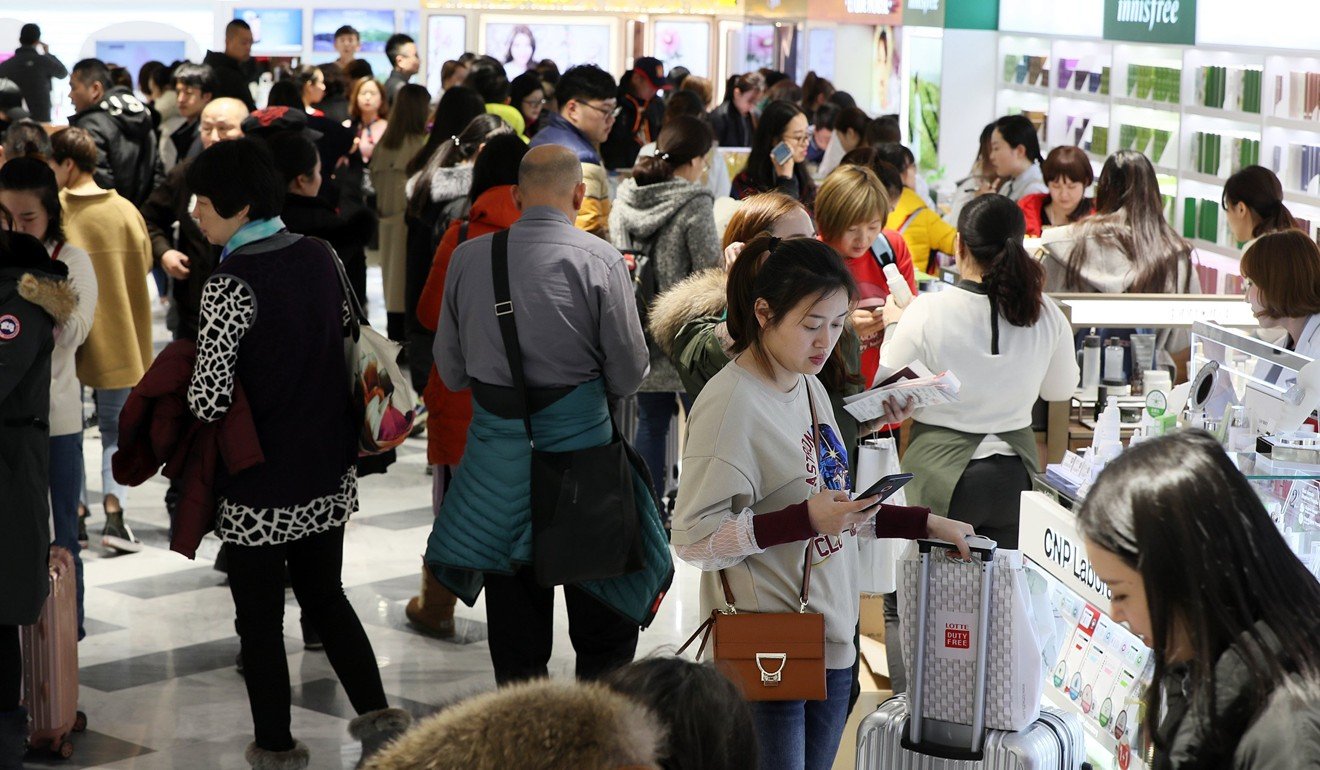 Retailers such as Lotte have seen a resurgence in Chinese visitor numbers. Photo: EPA
