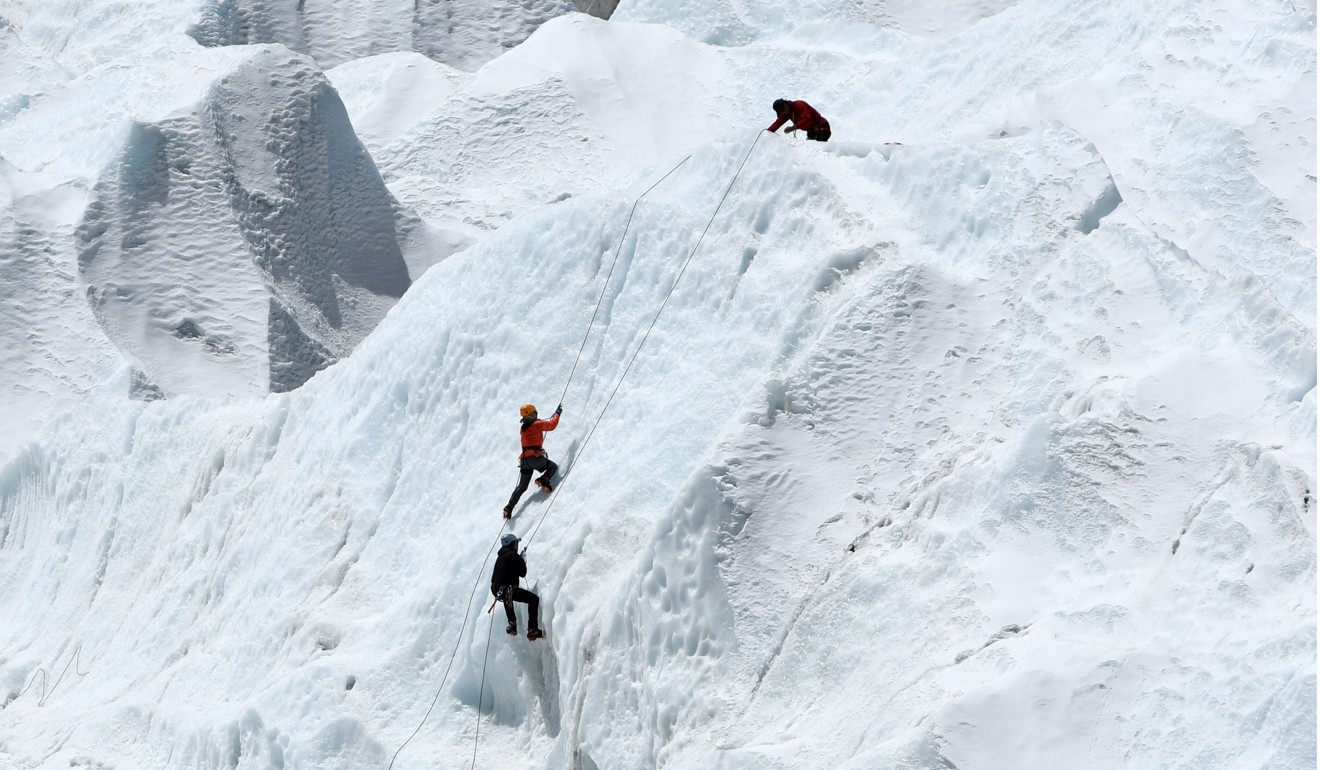 Climbers at Everest Base Camp practising their techniques on the Khumbu glacier. Photo: AFP