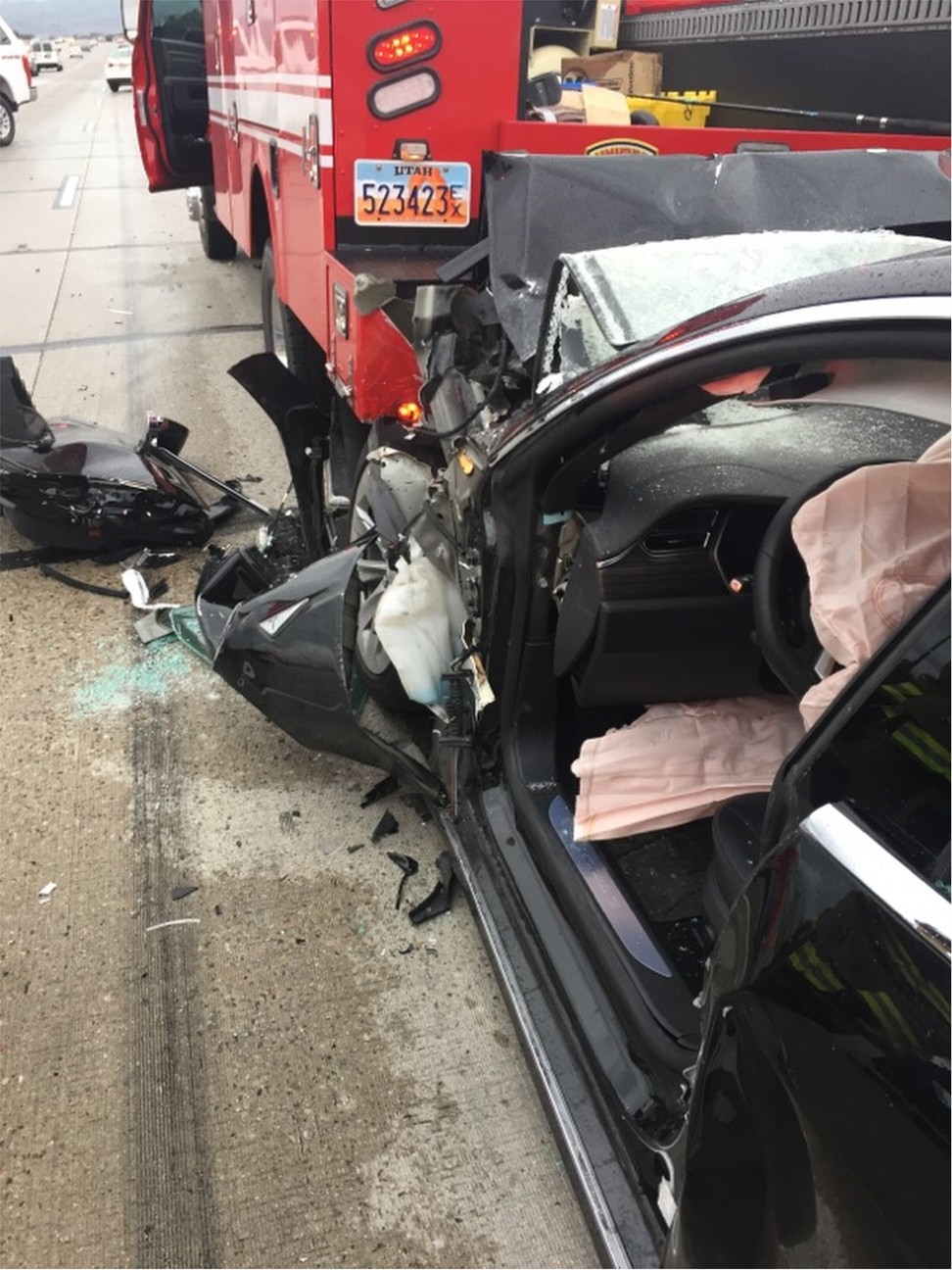 Police Sgt. Samuel Winkler said the car's air bags were activated and that the Tesla's 28-year-old driver suffered a broken right ankle, while the driver of the mechanic truck didn't require treatment. Photo: South Jordan Police Department via AP