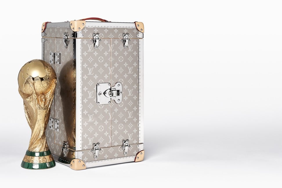 The FIFA World Cup Russia travel trunk is rendered in titanium.