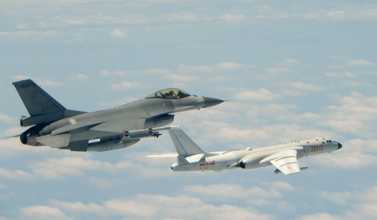 A Taiwanese F-16 fighter (left) flies alongside a PLA H-6K bomber that reportedly flew over the Bashi Channel, south of Taiwan, in a drill earlier this month. Photo: AFP