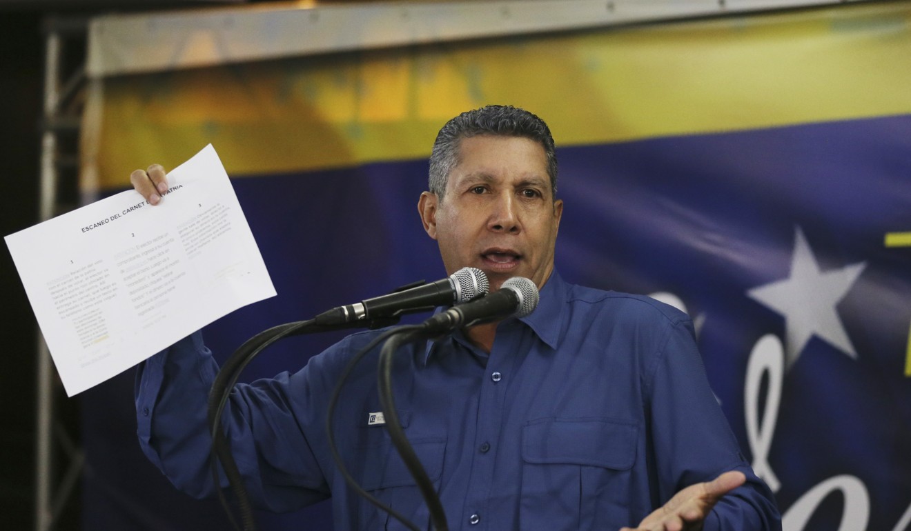 Anti-government presidential candidate Henri Falcon addresses supporters in Caracas, Venezuela. Photo: AP