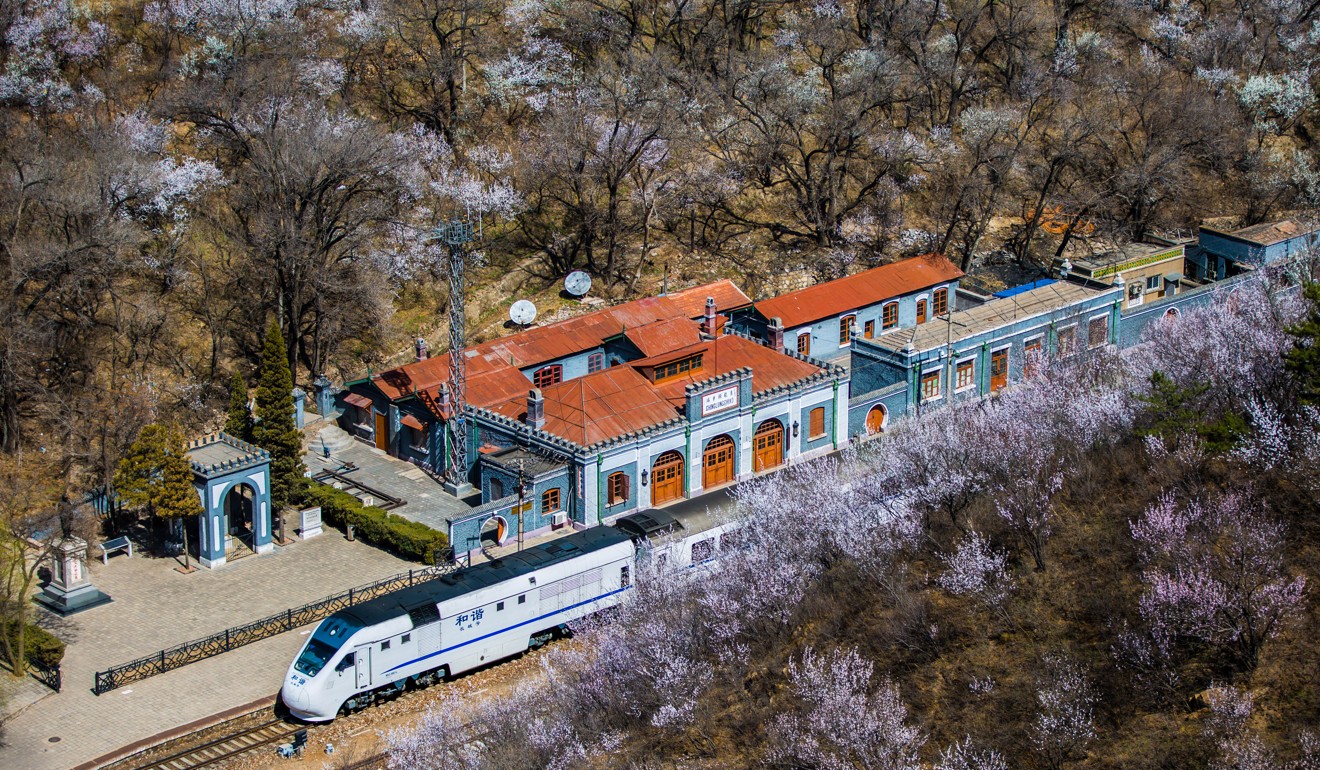 A high-speed train passes the century-old Qinglongqiao Railway Station on the Beijing-Zhangjiakou Railway, the first line designed, funded and built by Chinese people alone. Photo: Imaginechina