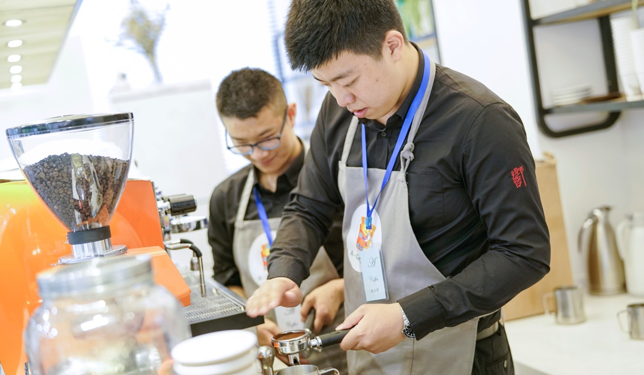 The staff were taught to make coffee at a school in the city. Photo: Alice Yan