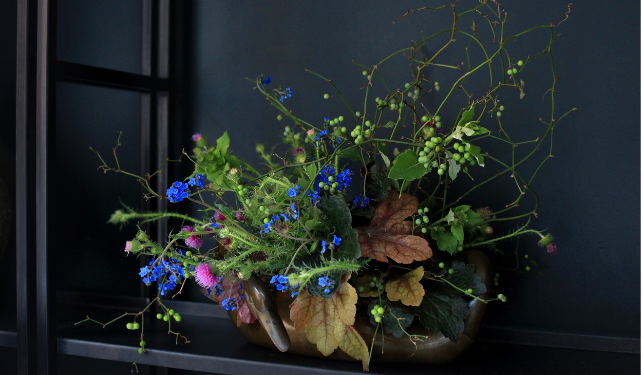A floral arrangement by Thompson.