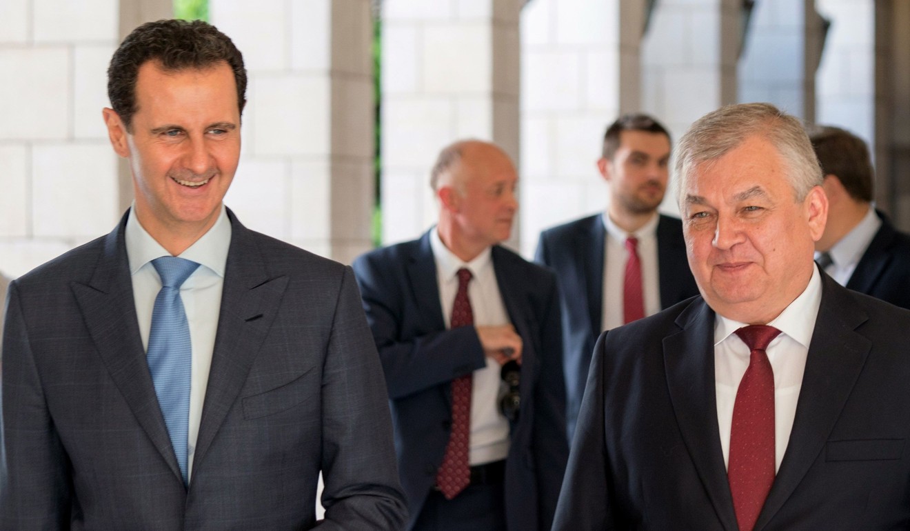Syrian President Bashar al-Assad welcomes Russian President's Special Envoy on Syria Alexander Lavrentiev in the Syrian capital Damascus. Photo: AFP