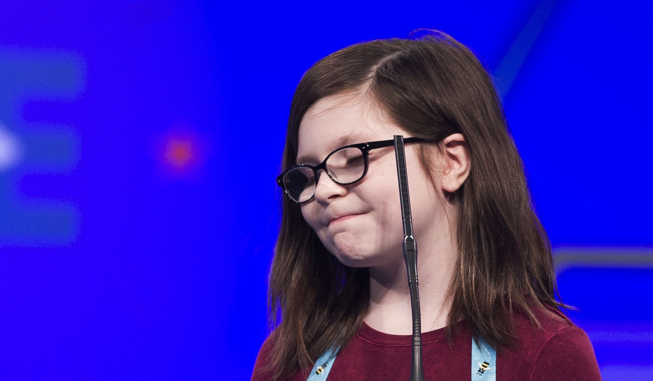 Sophia Clark, 11, from White Marsh, Maryland, misspells during the second round of thebee. Photo: AP