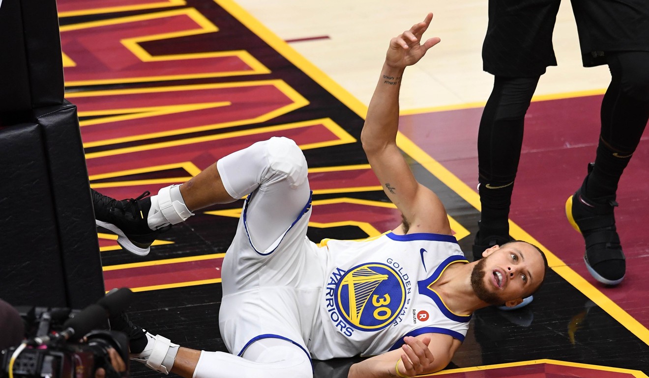 Stephen Curry had an off night for the Golden State Warriors, but sank a crucial three down the home straight. Photo: AFP