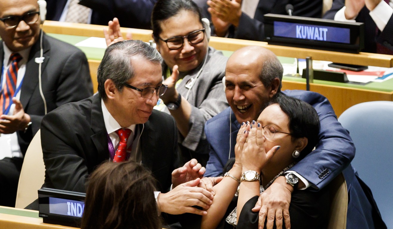 Indonesian Foreign Minister Retno Marsudi and her delegation react after Indonesia was elected to one of the five non-permanent seats on the United Nations Security Council. Photo: EPA