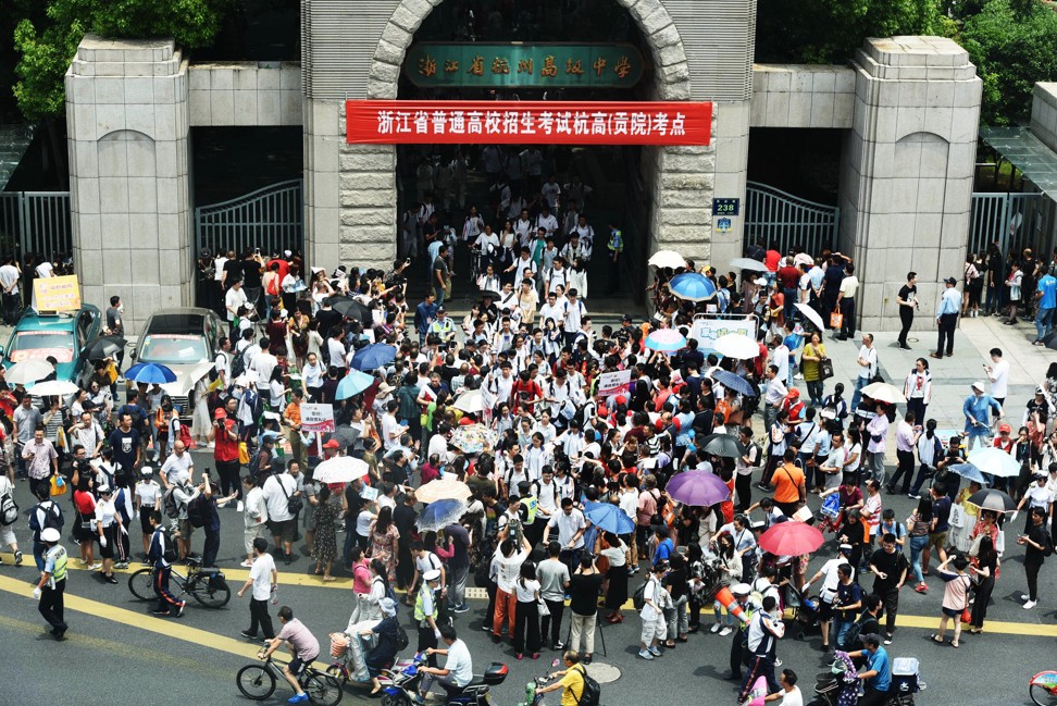 Students walk out of a school on the first day of the university entrance exam in China, or the ‘gaokao’, in Hangzhou, China on June 7. Photo: AFP