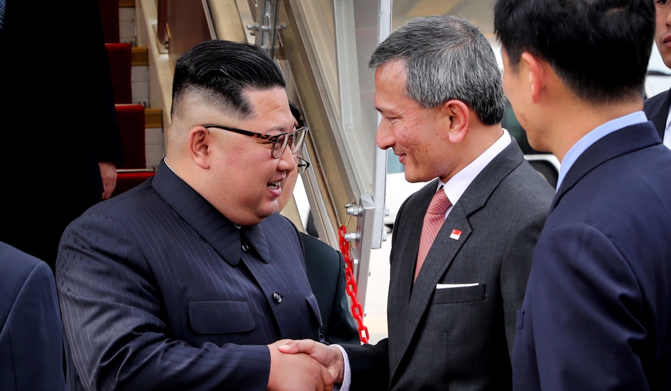 Kim Jong-un is welcomed by Singapore’s Foreign Minister Vivian Balakrishnan as he arrives in the city state on Sunday ahead of a meeting with Donald Trump. Photo: AFP/Ministry of Communications and Information of Singapore