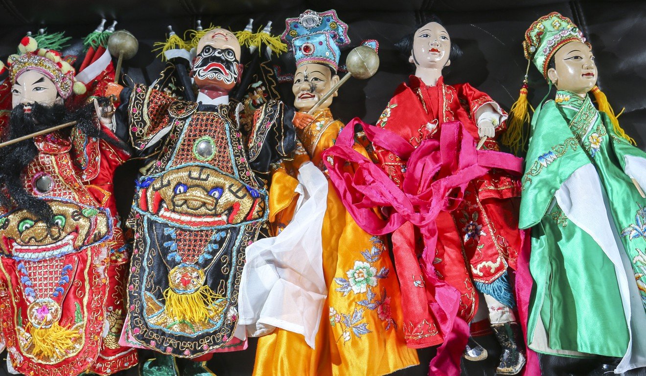 The elaborate costumes of hand puppets. Photo: Dickson Lee