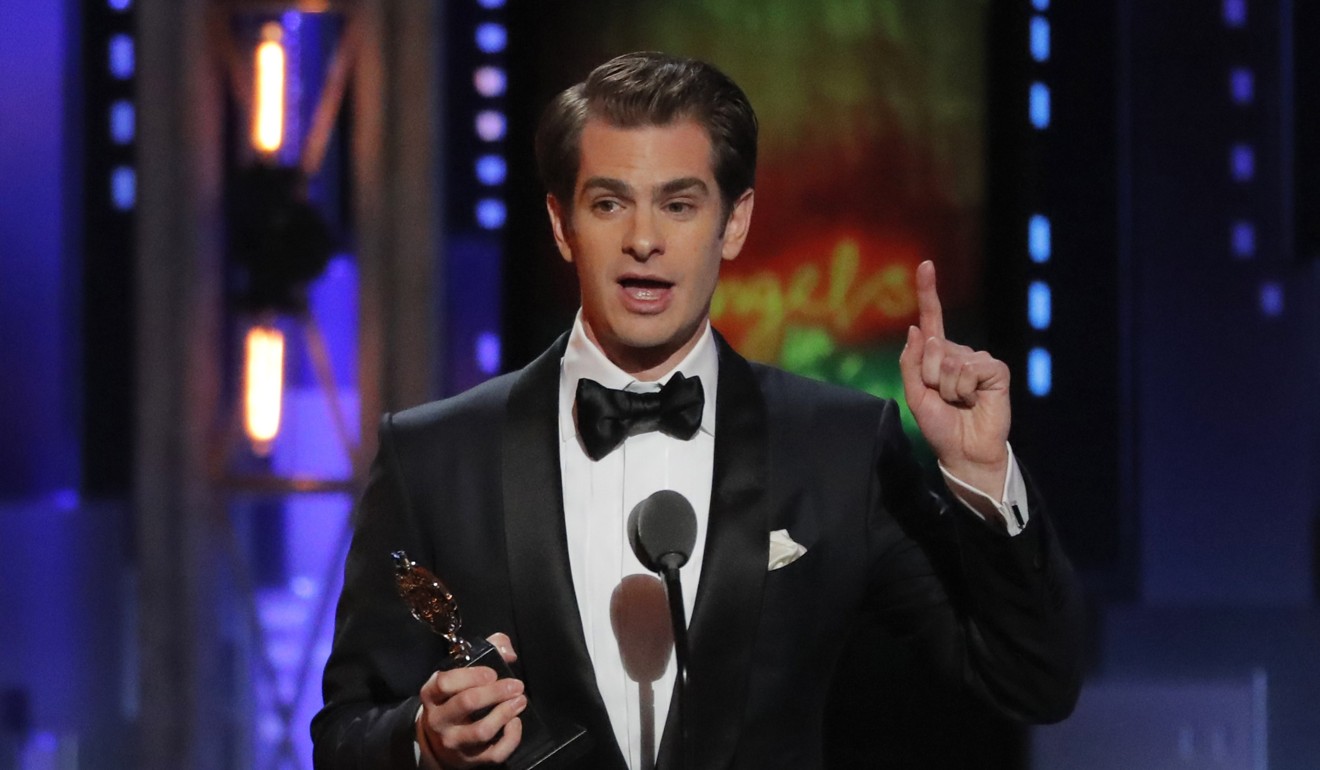 Andrew Garfield accepts the Tony award for Best Performance by an Actor in a Leading Role, for “Angels in America”. Photo: Reuters