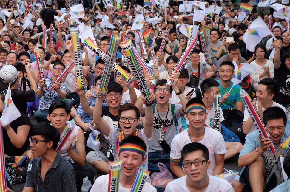 Activists celebrate after the court ruling in Taipei last year. Photo: EPA