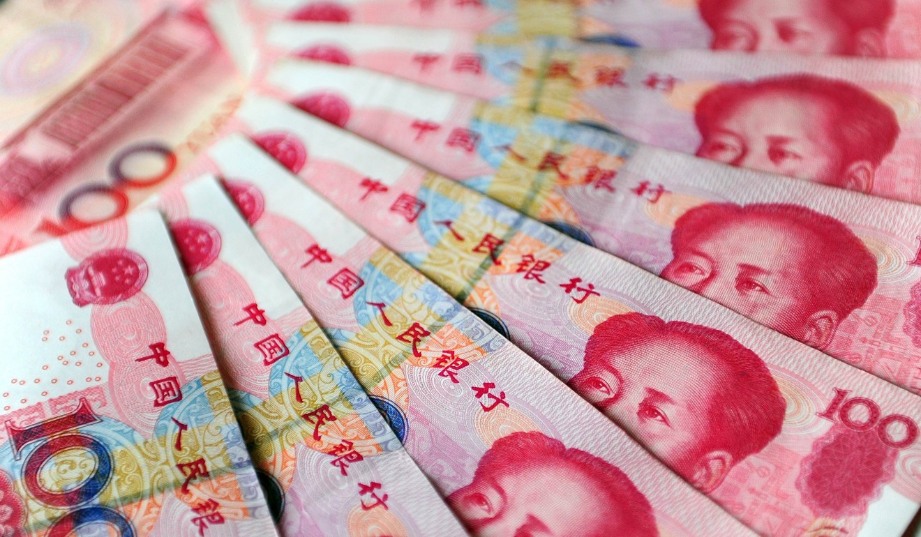 Shao Yu, chief economist at Oriental Securities in Shanghai, said China needed to make it even easier for funds to be taken out of the country. Photo: AFP