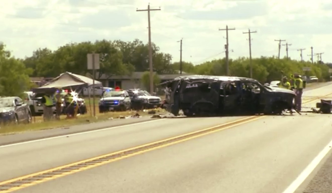This frame grab from video provided by KABB/WOAI in San Antonio shows the scene on Texas Highway 85, where authorities say five people are dead after an SUV carrying more than a dozen people crashed on Sunday in Big Wells, Texas, while fleeing from Border Patrol agents. Photo: KABB/WOAI via AP