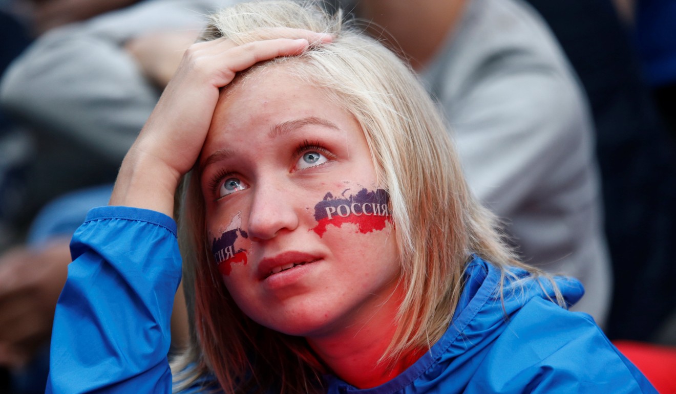 Russian fans were dejected after Uruguay ended their thrilling early run at the World Cup. Photo: Reuters