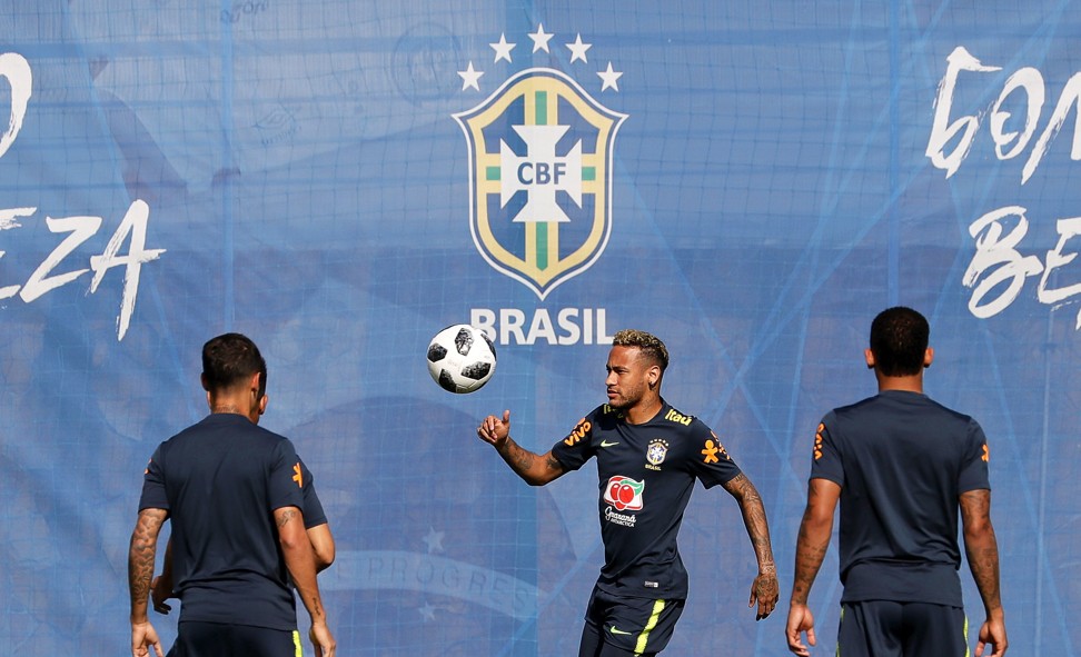 Neymar (centre) and his teammates during a training session. Photo: EPA