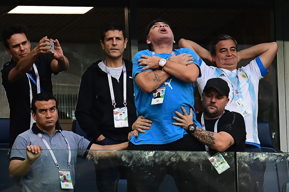 Maradona (centre) celebrates Lionel Messi’s opening goal. Photo: AFP