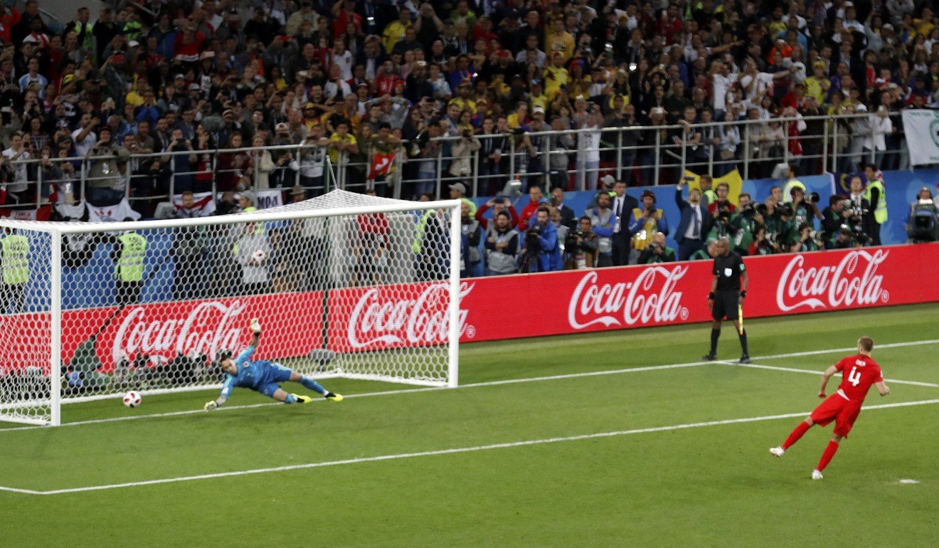 England's Eric Dier scores a penalty past Colombia goalkeeper David Ospina. Photo: AP