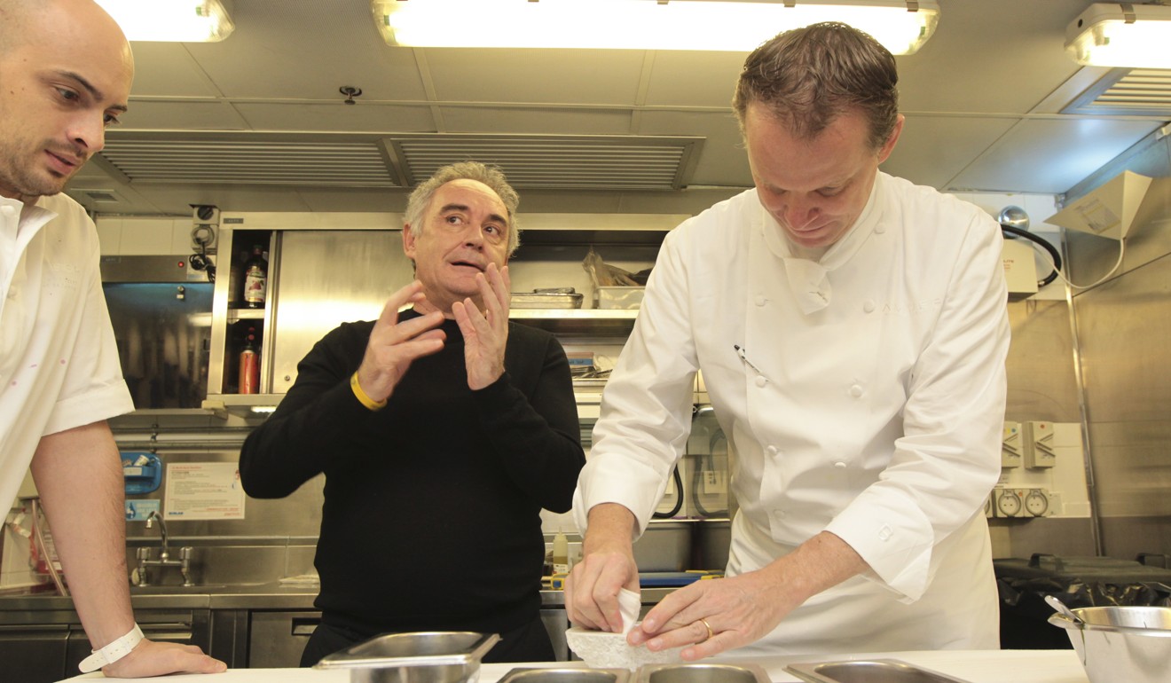 A rare sight – Ferran Adria in a kitchen at Amber in The Landmark Mandarin hotel in Hong Kong in 2015 with chefs Maxime Gilbert and Amber’s Richard Ekkebus before they cooked a four-hands, HK$10,888-per-head dinner. Photo: Bruce Yan