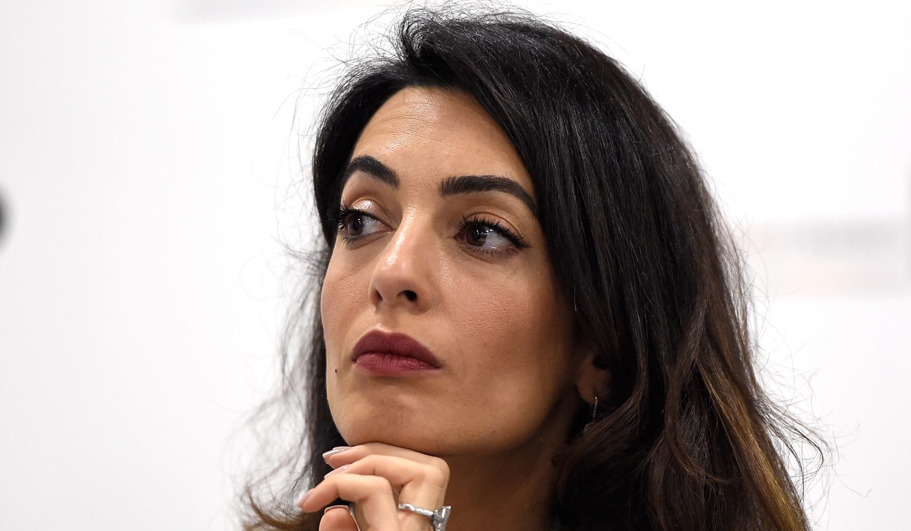 Prominent rights lawyer Amal Clooney, the wife of actor George, joined the Reuters legal team to add weight and profile to their defence. File photo: EPA