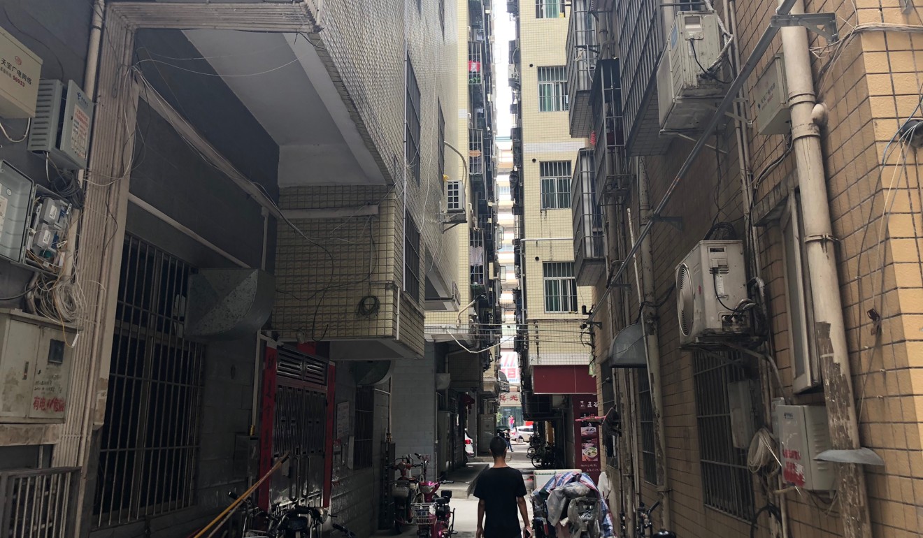 Old residential blocks in urban villages are also called “handshaking buildings” – they are so close to one another that residents from two different buildings can shake hands through their windows. Photo: Pearl Liu