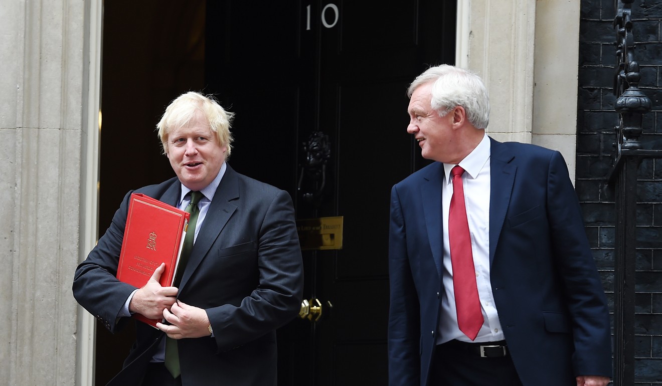 Former British foreign secretary Boris Johnson (left) and former Brexit secretary David Davis leave after a cabinet meeting at Downing Street in this September 2016 file photo. Photo: EPA