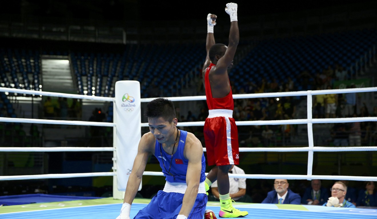 Lu Bin of China reacts after losing to Peter Mungai Warui at the 2016 Rio Olympics. Photo: Reuters