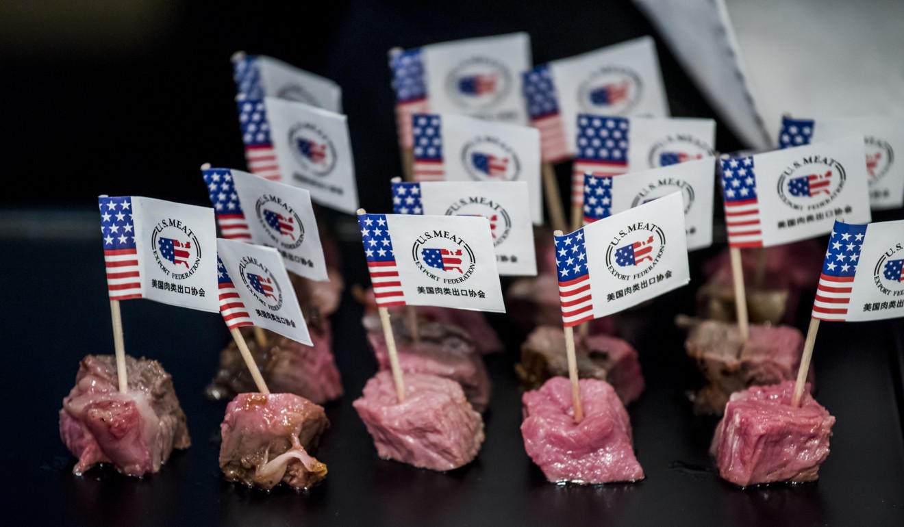 Samples of US beef branded with American flags are displayed at a promotional event in Beijing. Photo: AFP