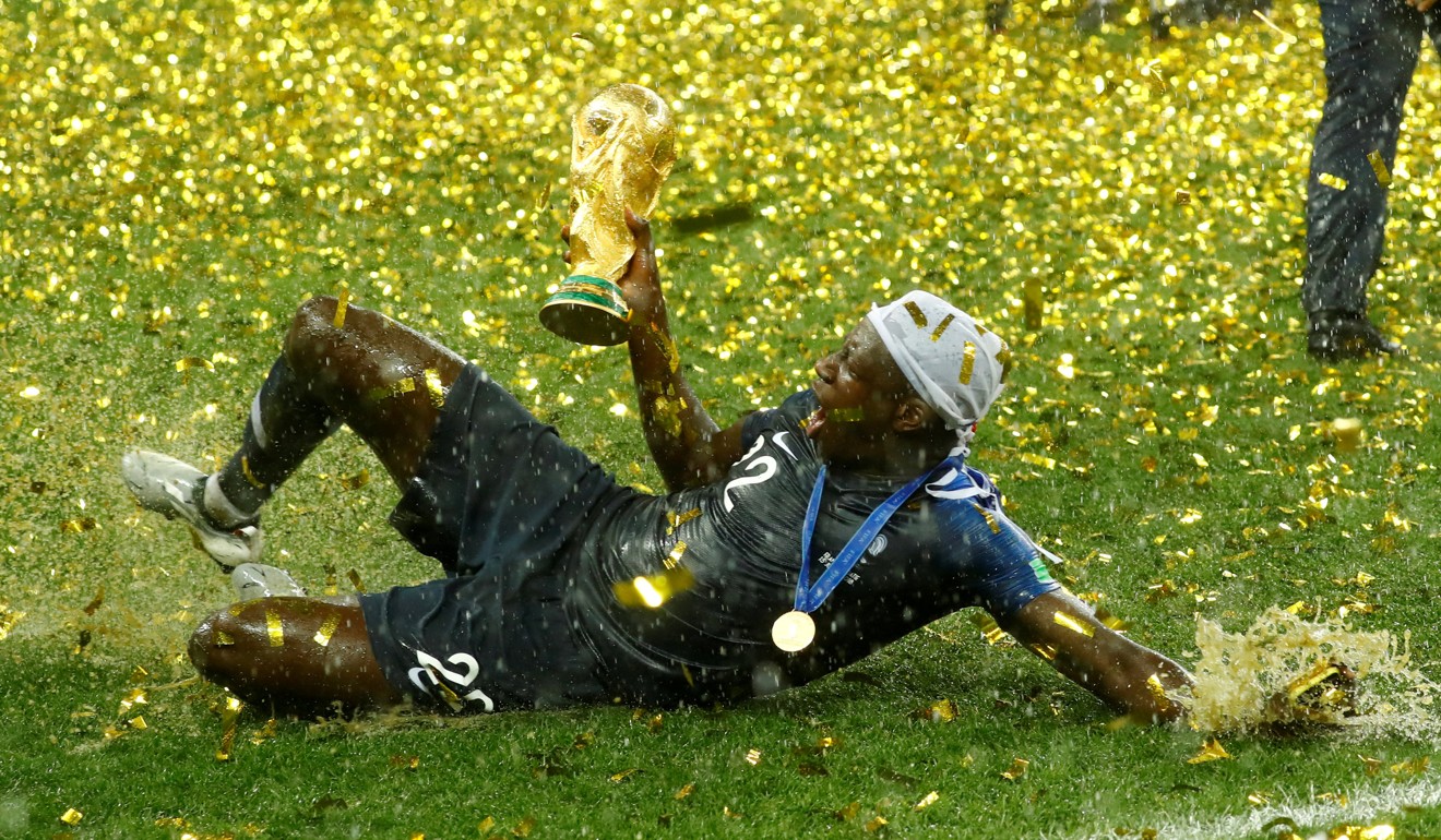 Benjamin Mendy celebrates with the trophy after winning the World Cup with France. Photo: Reuters