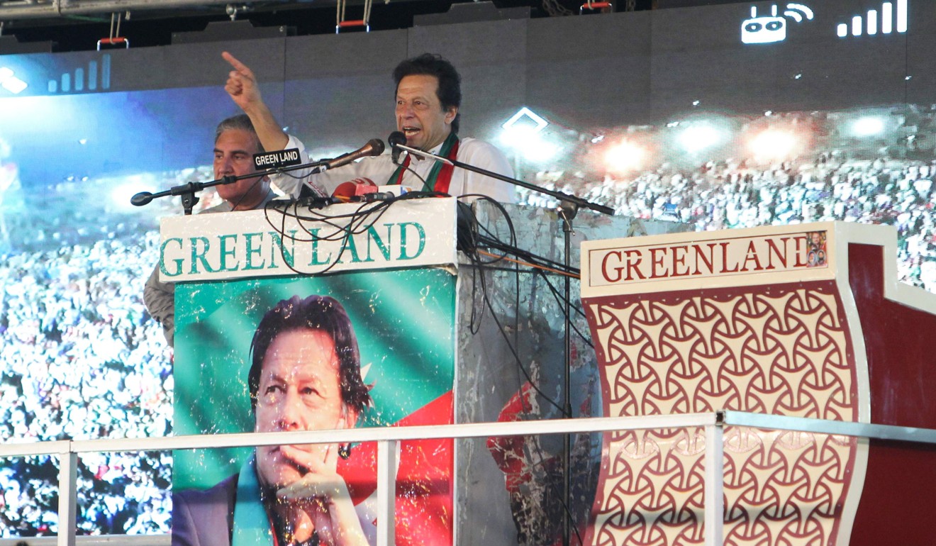 Pakistani cricket star-turned-politician and head of the party Pakistan Tehreek-e-Insaf Imran Khan at a campaign rally on July 20, 2018. Photo: AFP